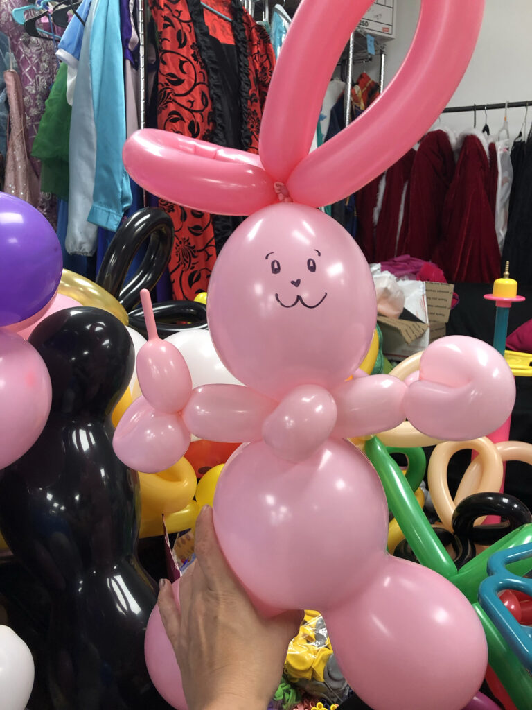 A balloon twisting bunny